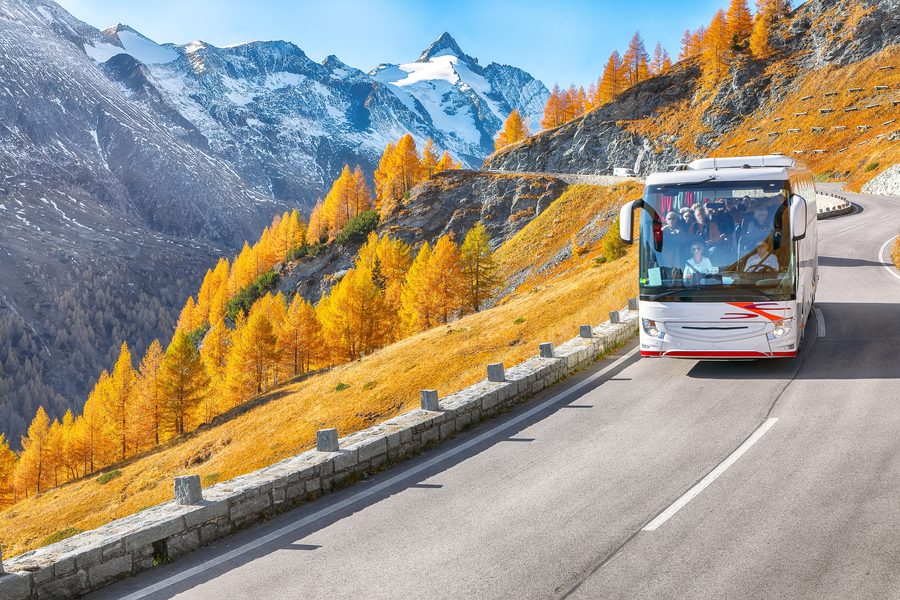 Coach descending a winding mountain road