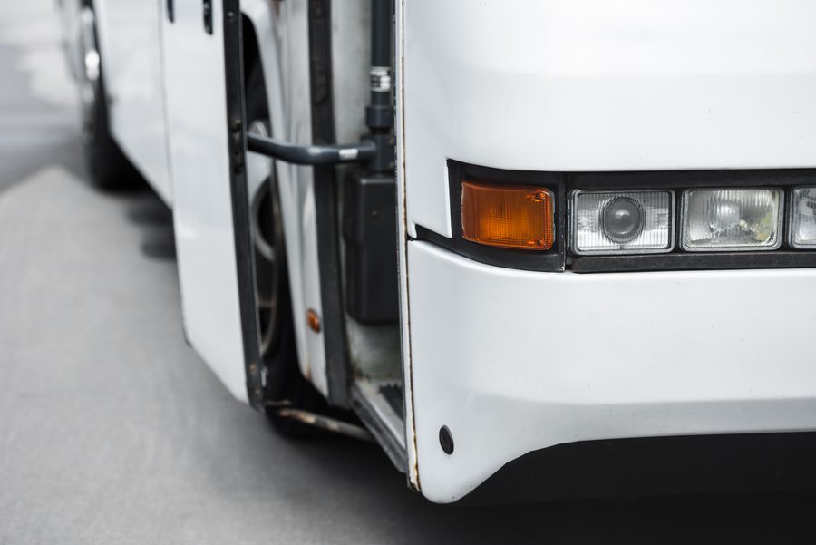 Close-up of a coach's front corner and headlight